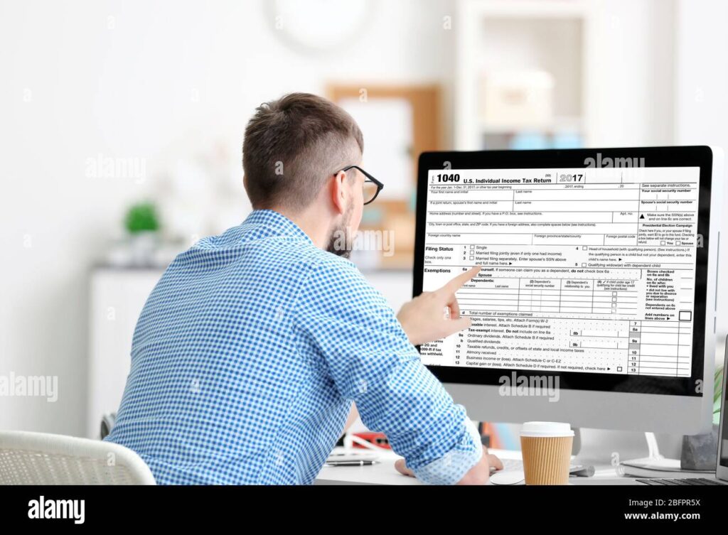 Comment s'inscrire aux impôts pour la première fois en France 1 une personne remplissant un formulaire fiscal 2